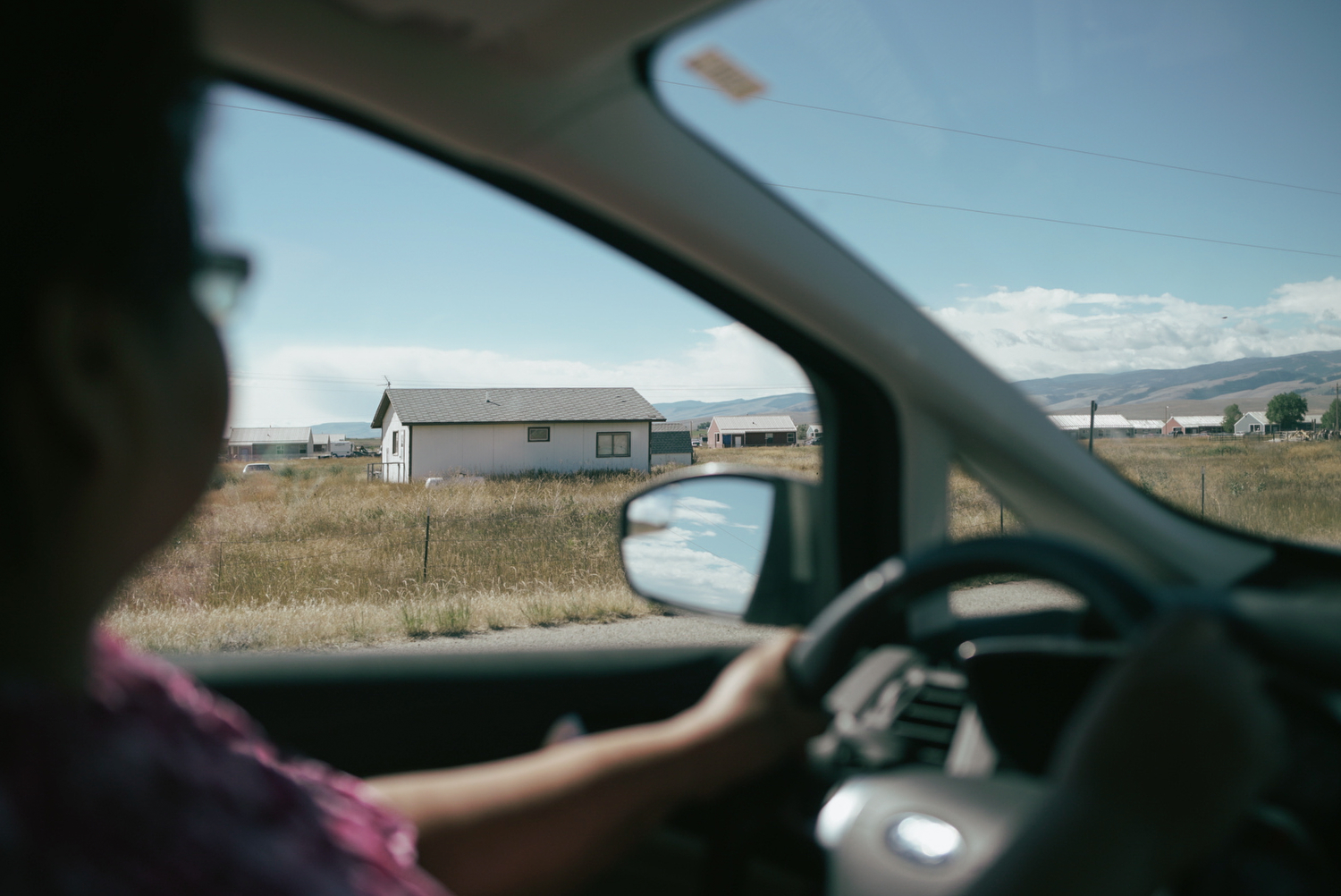 Elsie drives on the reservation, pointing out houses where she or her family members used to live. Because Elsie is from the community she serves, she’s better able to empathize with the challenges faced by the parents she works with, according to her boss, Kim Clemetson, who directs Wind River’s Family Spirit home visiting program.