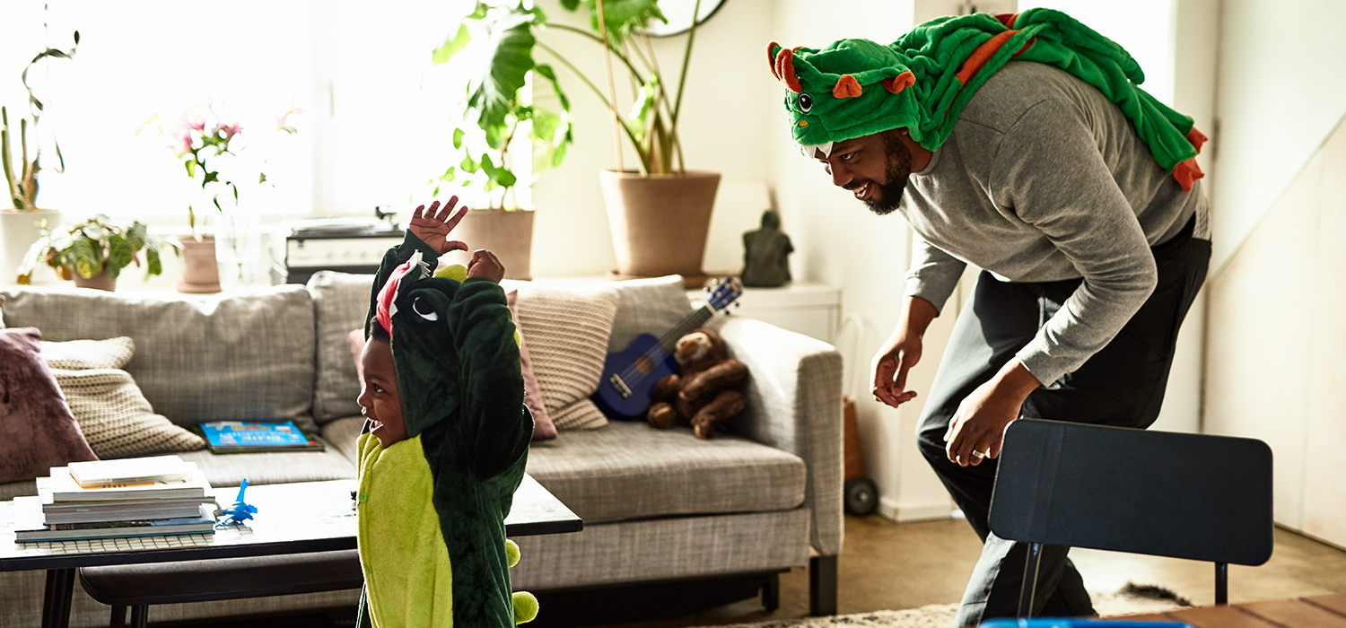 Dad and child play dress up