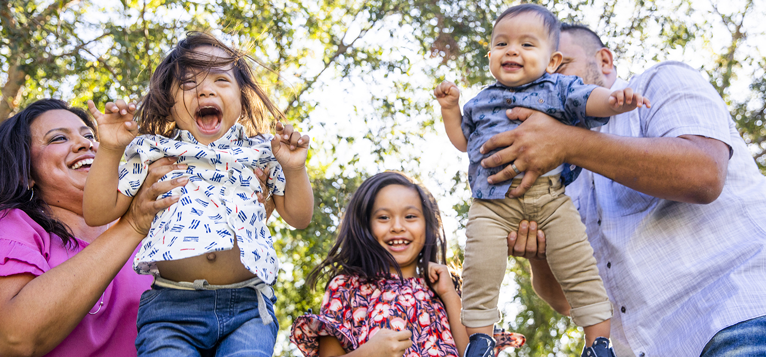 A family plays outside
