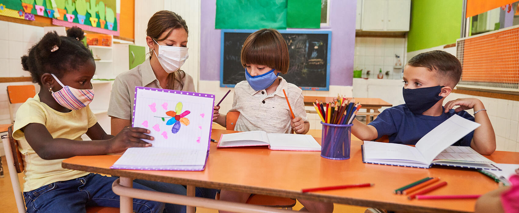 Elementary school teacher with children