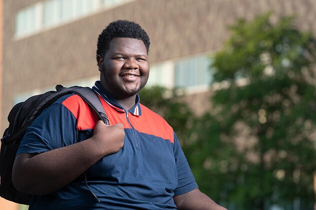 Roderick Dreher carrying a backpack