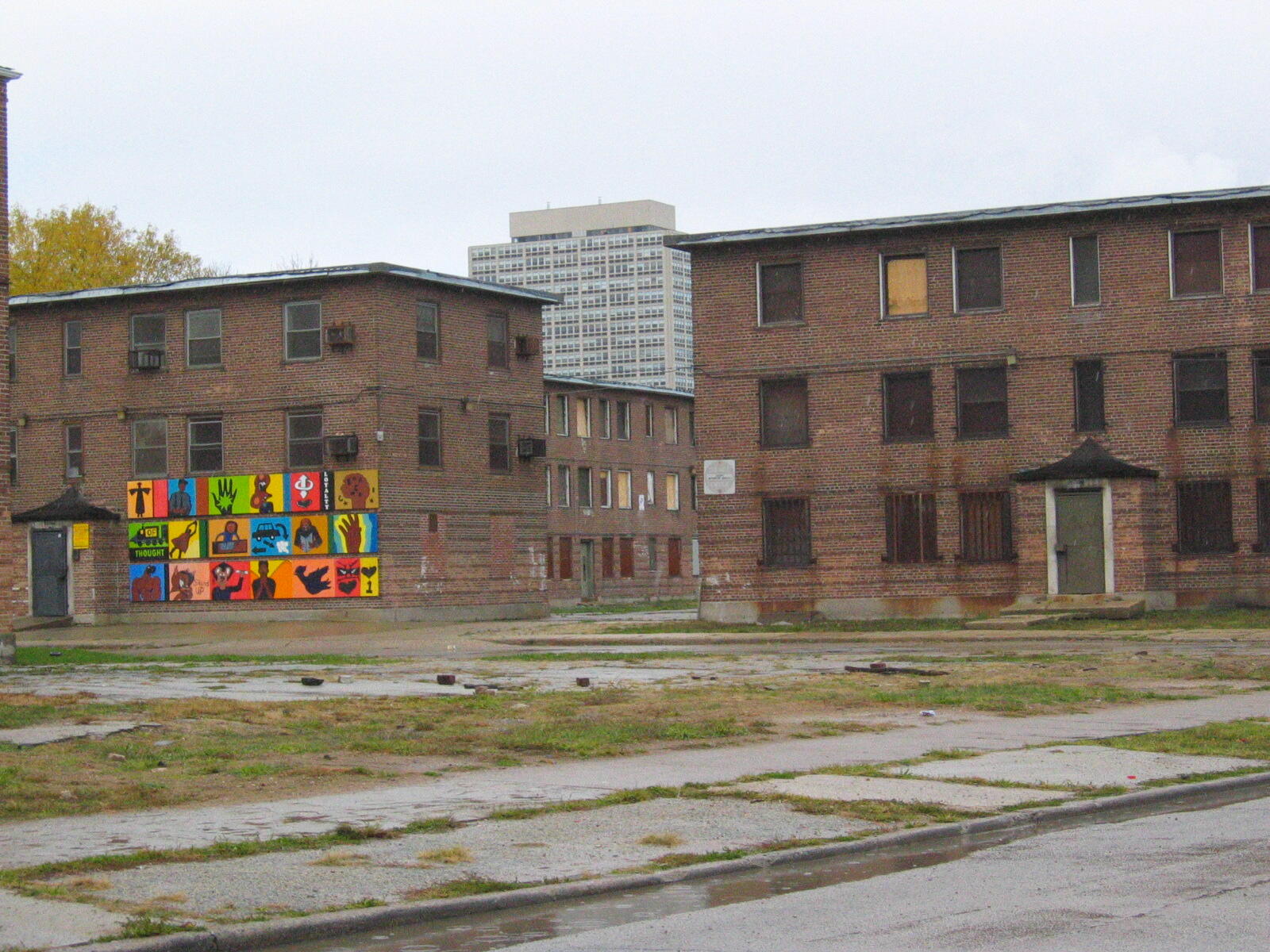 Wells Homes. Residents were still living in these buildings
