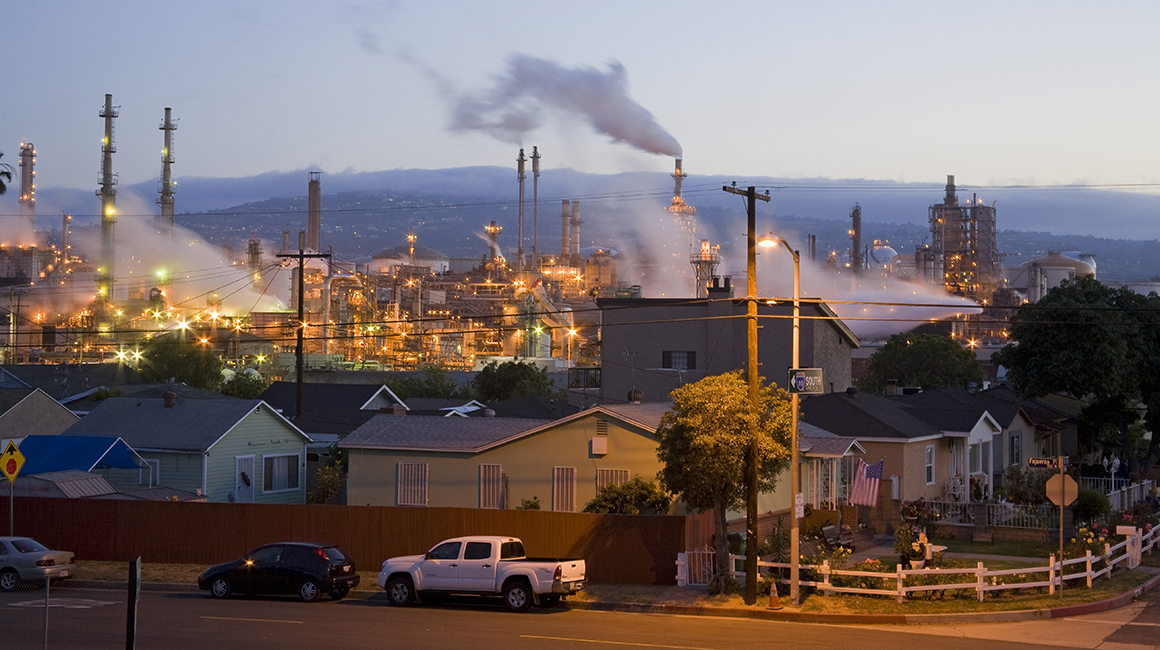 Residential houses next to oil refinery