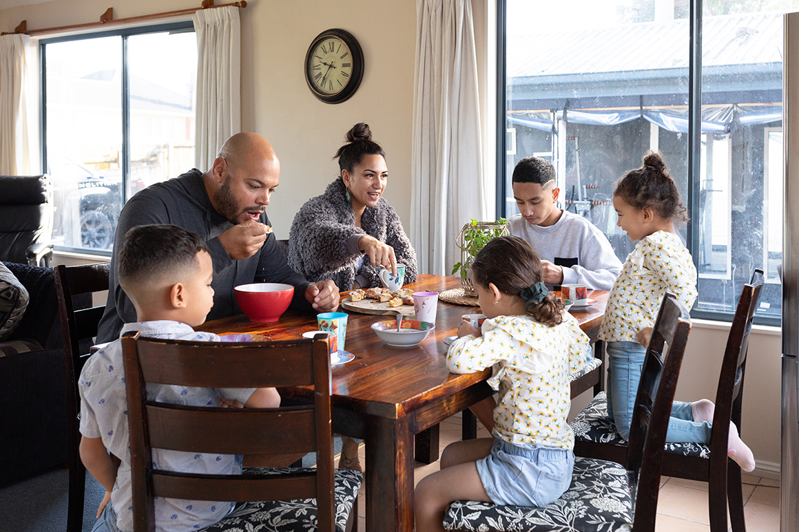 A family gathered around a dinner table.