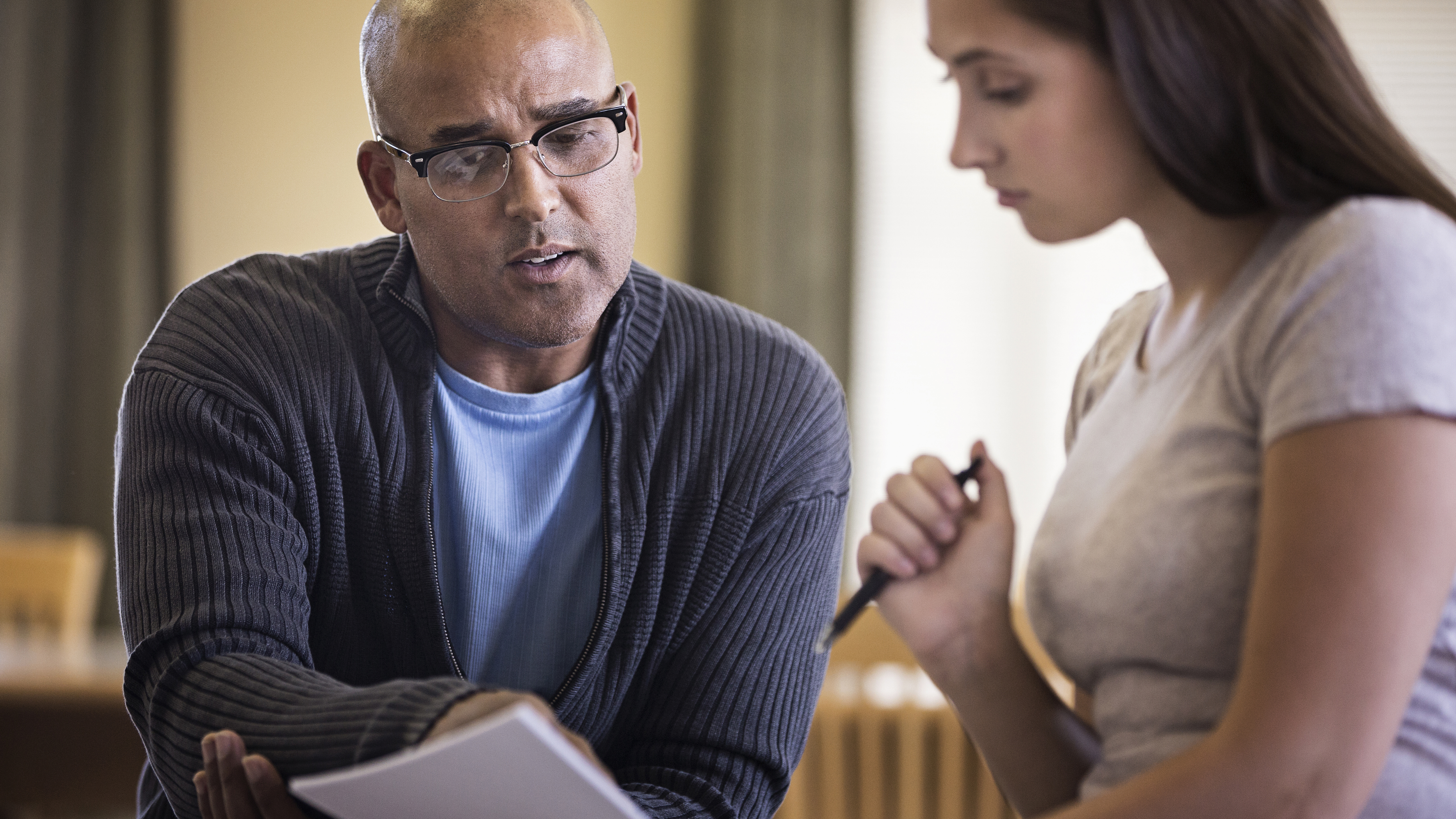 Colleagues reviewing a file