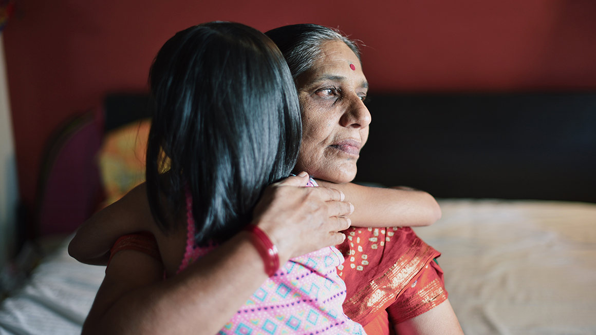 Mother and child embracing. 