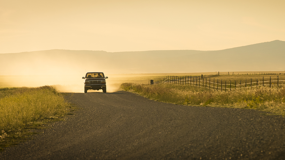 Car driving on a backroad