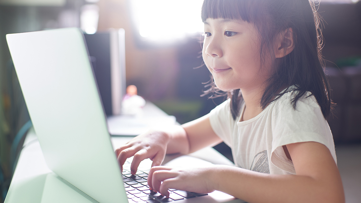 Child using a laptop