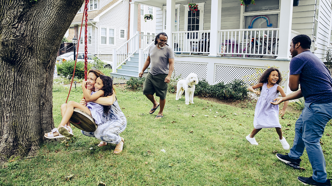 Family outside their house.