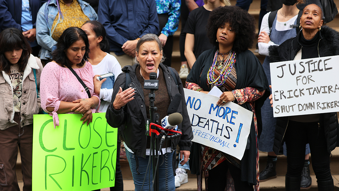 Protestors holidng signs. 