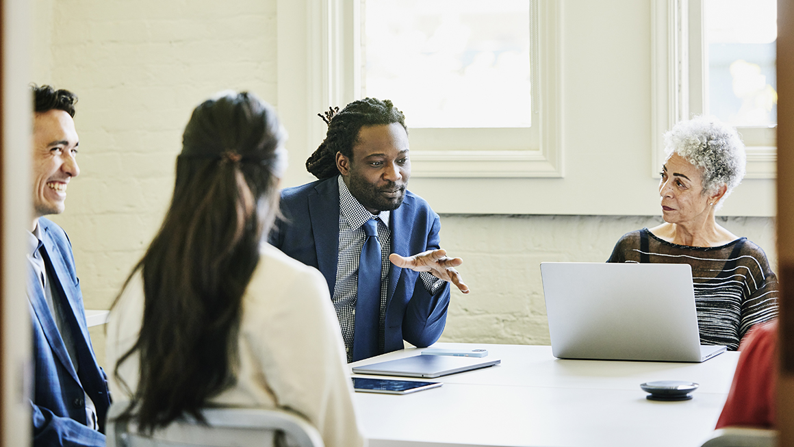 A group of workers during an office meeting.