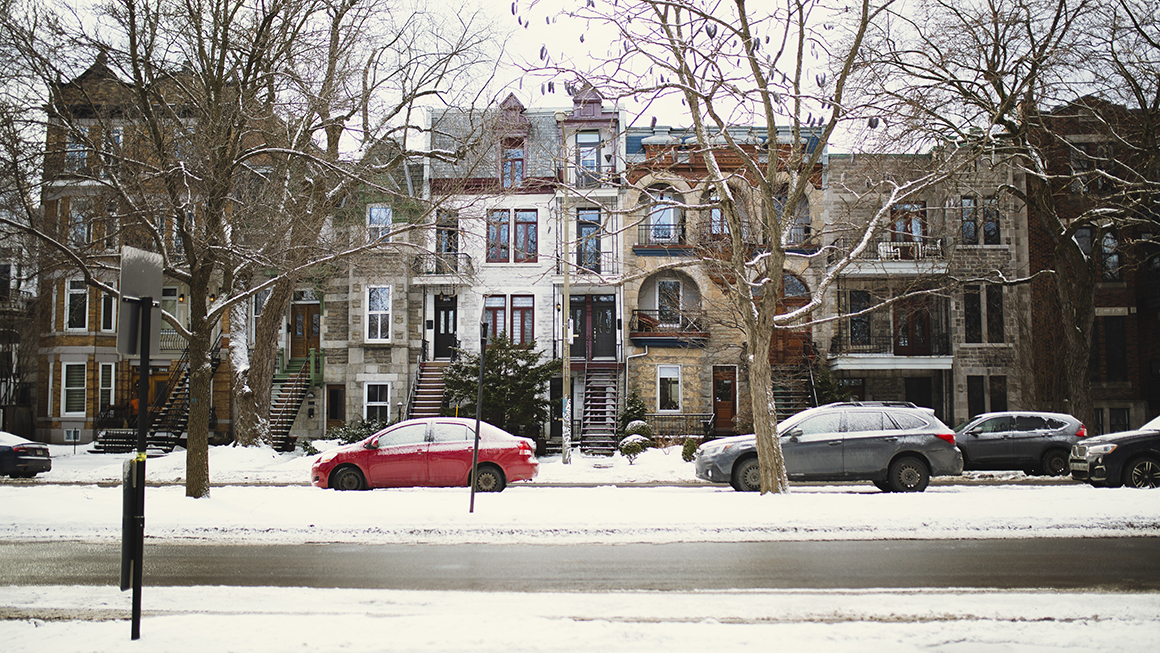 A row of homes during winter.