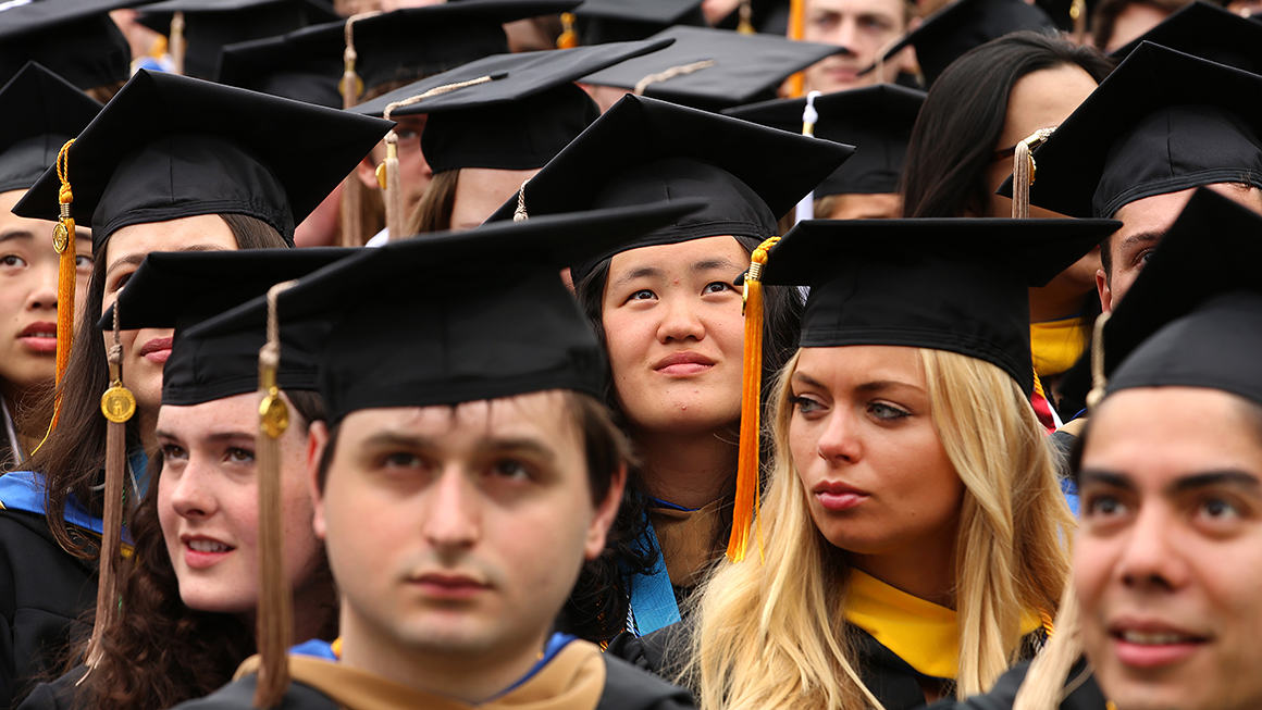 college graduates at the ceremony.