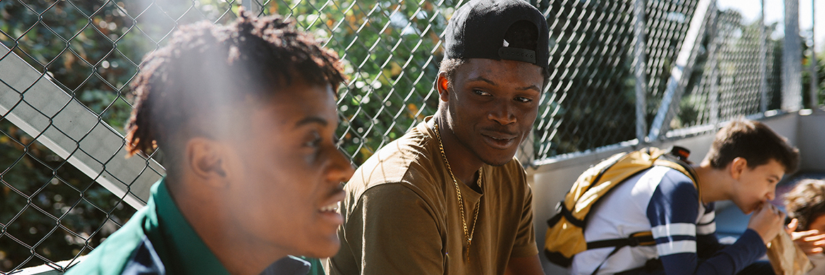 High school kids hanging out in school after classes