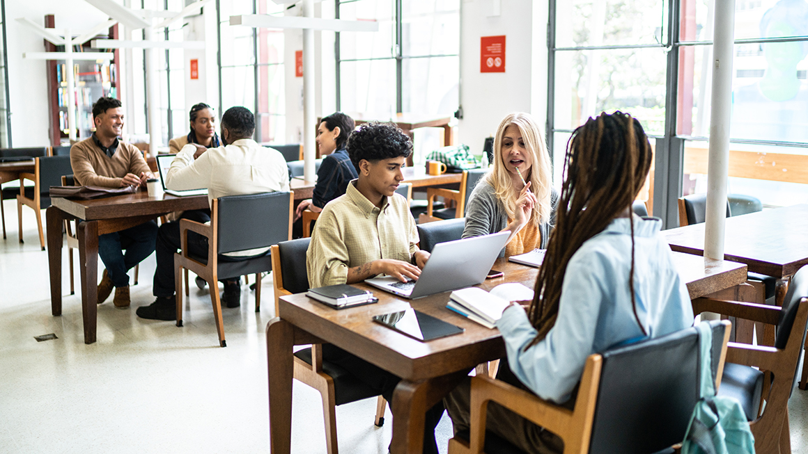 Students working at a desk.