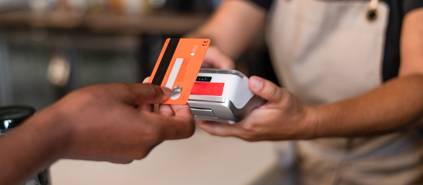 Someone paying with a credit card.