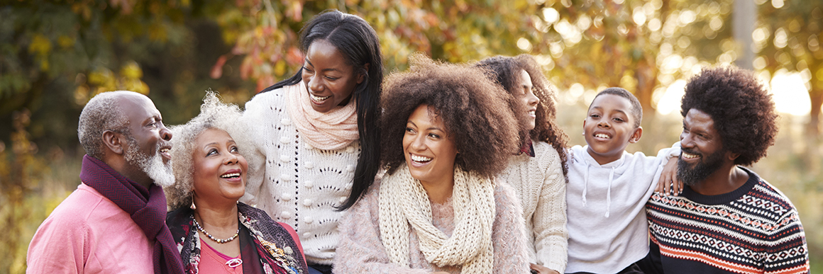 Multi Generation Family On Autumn Walk In Countryside Together