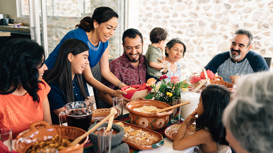 A large family around a dinner table.