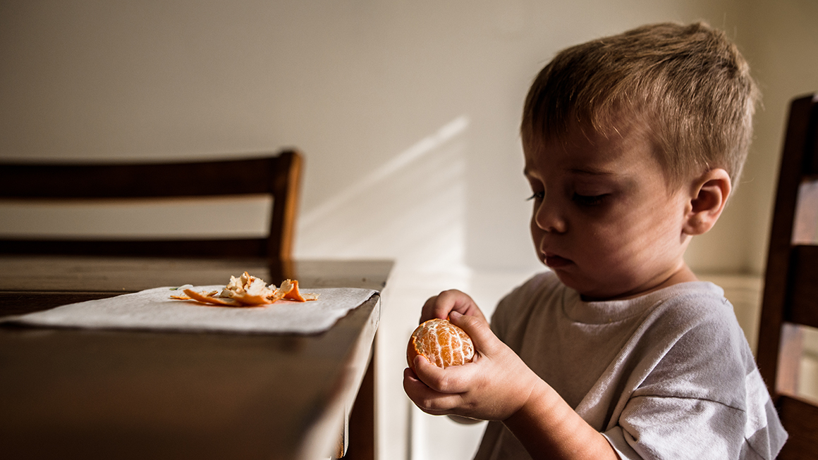 photo of child at dinner table