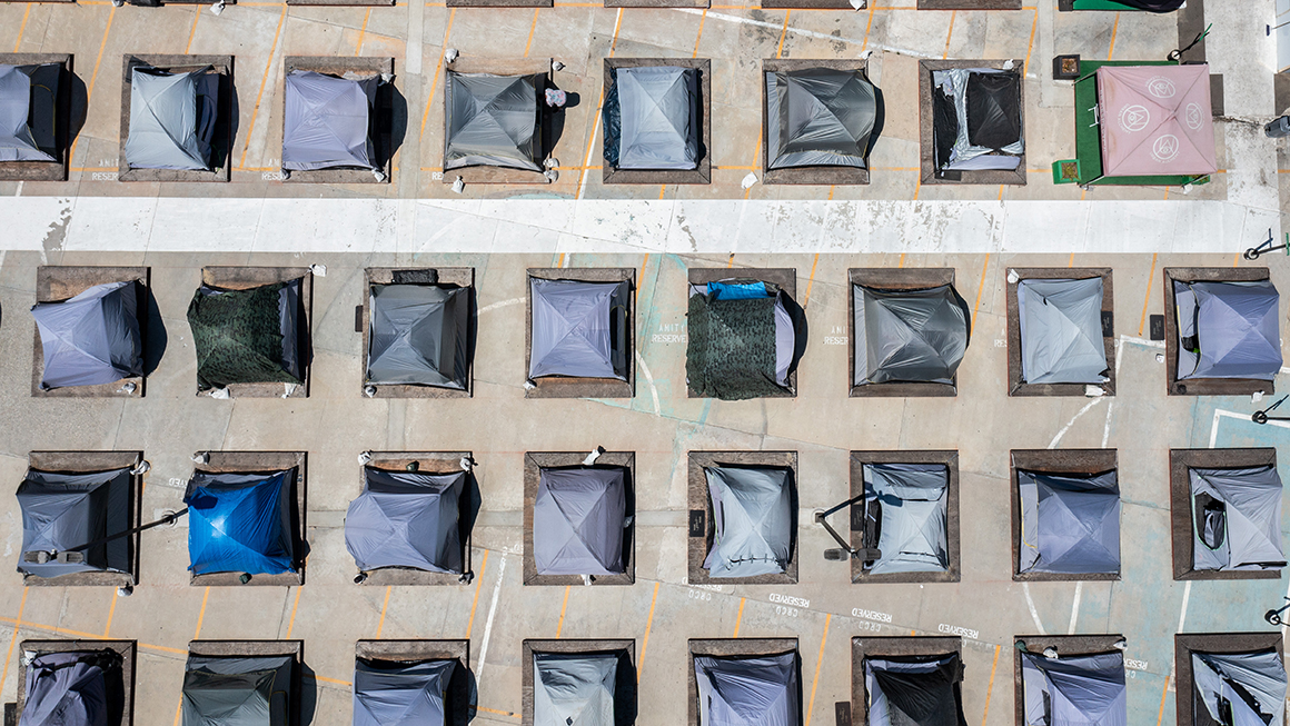 photo of a drone’s view of a visit to the Urban Alchemy homeless site, along South Central Avenue, in Los Angeles, CA