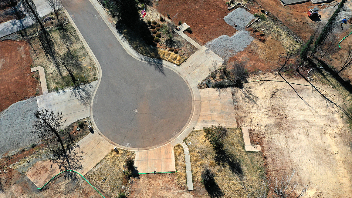 An aerial view of a neighborhood destroyed by the Camp Fire October 21, 2019 in Paradise, California