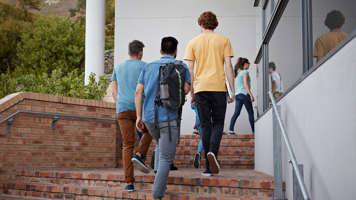 photo of students walking up stairs