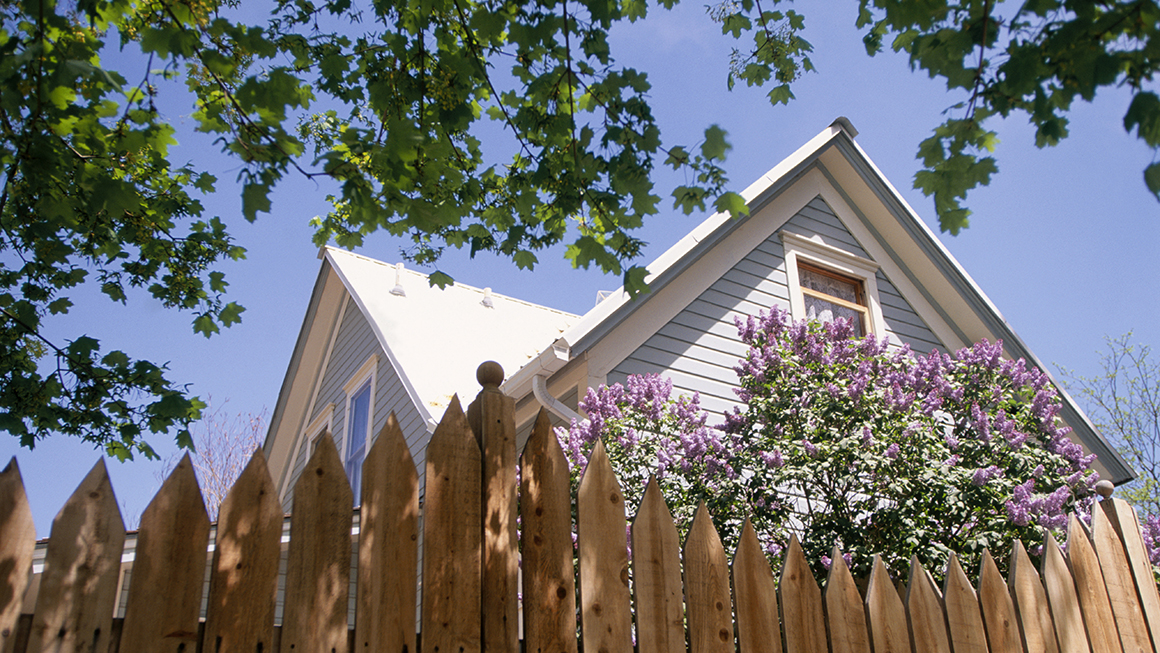 photo of fence and house