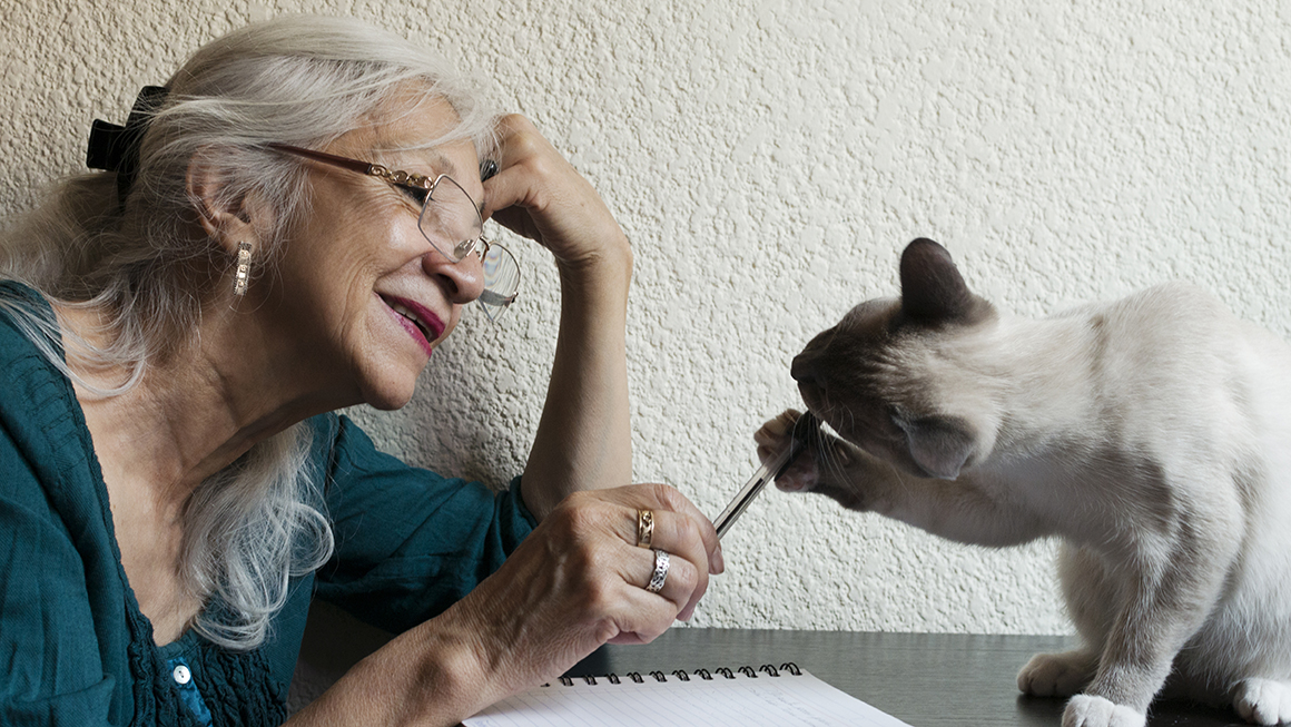 photo of older adult with cat