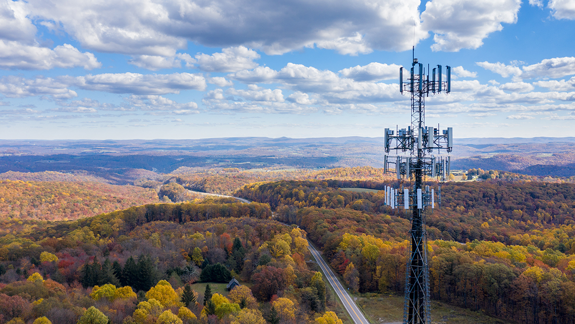 photo of cell phone or mobile service tower in forested area of West Virginia