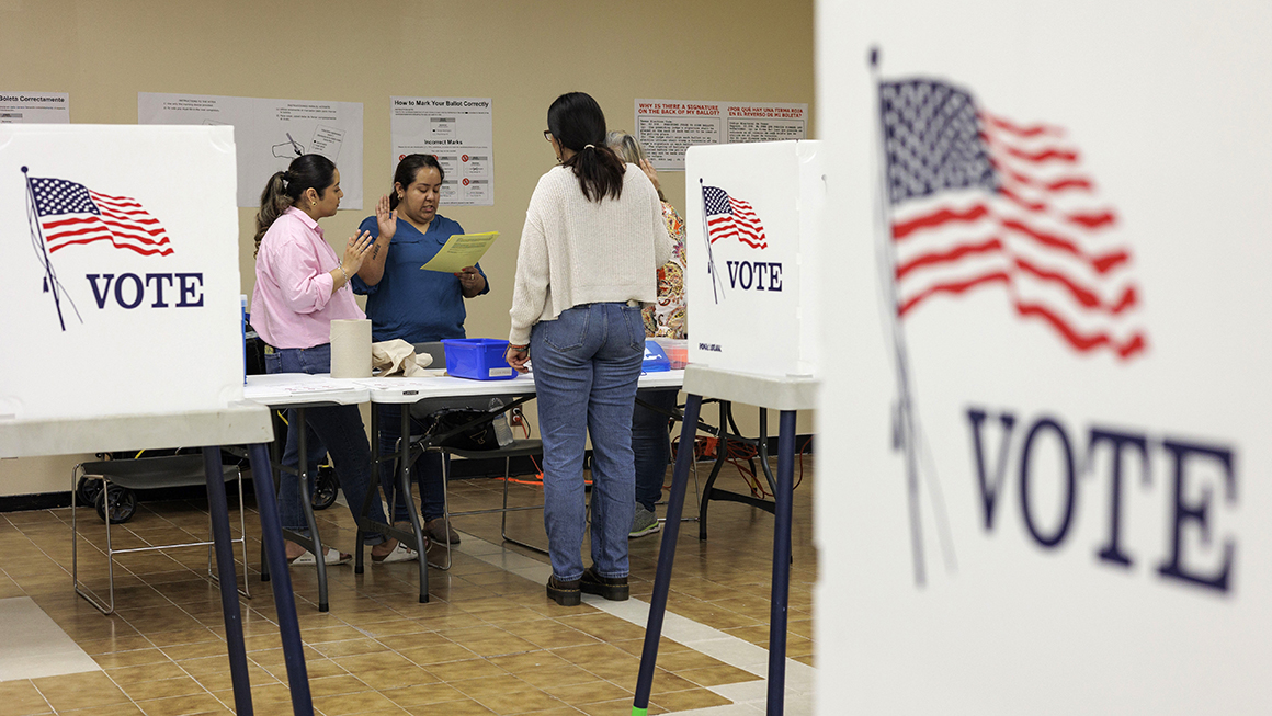 photo of poll workers taking their oaths at the Cameron County Courthouse polling place on March 5, 2024 in Brownsville, United States. 