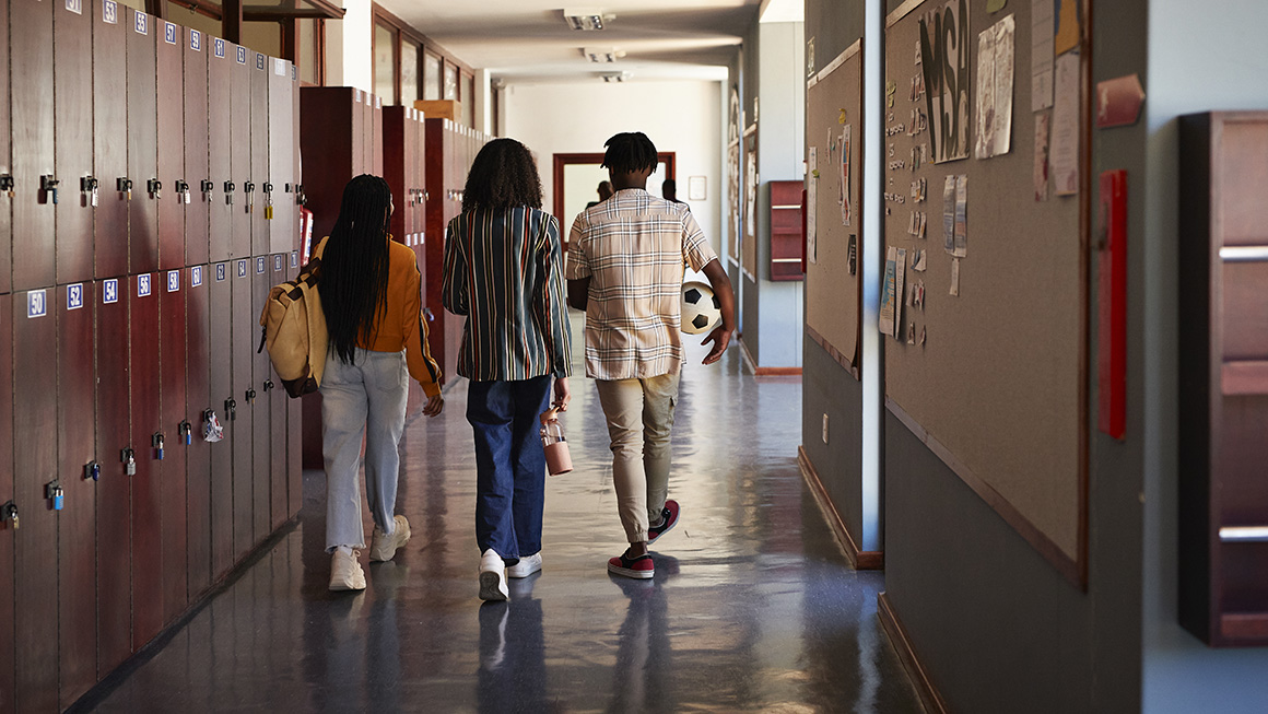 photo of students walking down school hallway