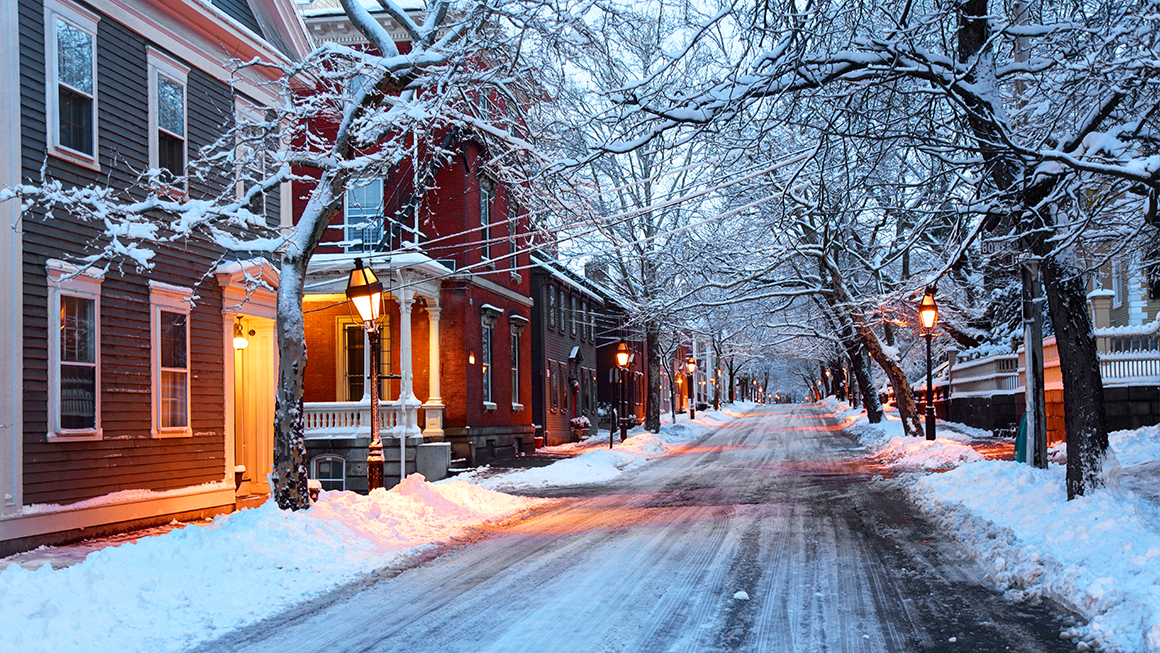 photo of snowy road and house