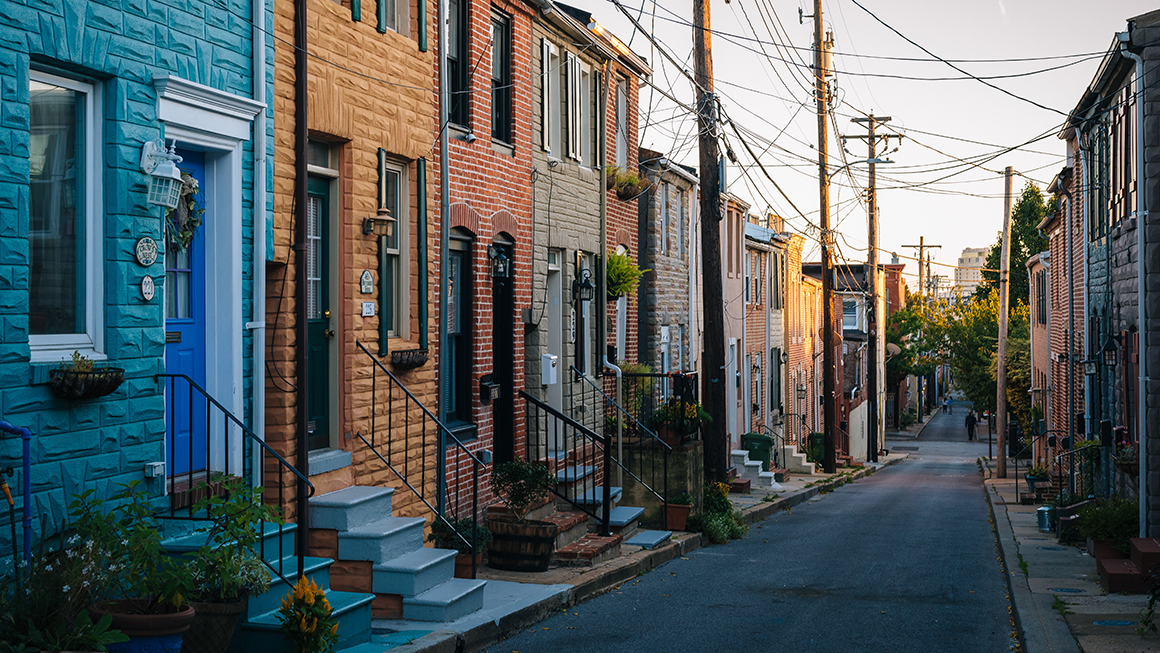 Colorful row houses along Chapel Street in Butchers Hill, Baltimore, Maryland