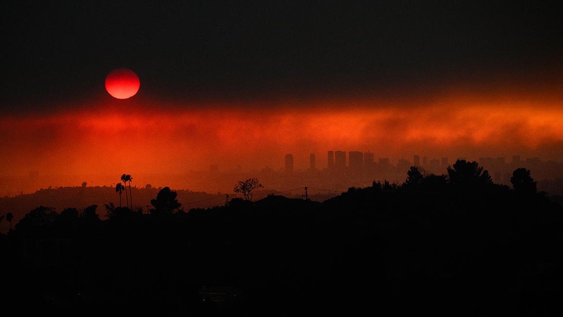 An aerial image shows smoke from wildfires including the Eaton Fire and Palisades Fire in Los Angeles, California, on January 8, 2025.