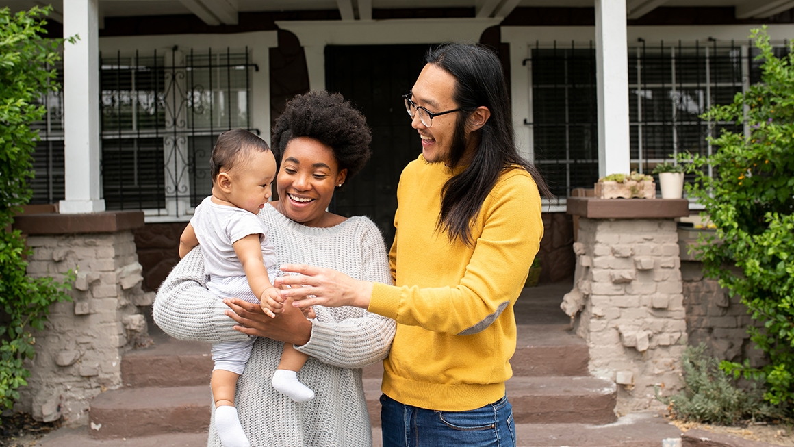 Happy diverse family spending time together at the porch