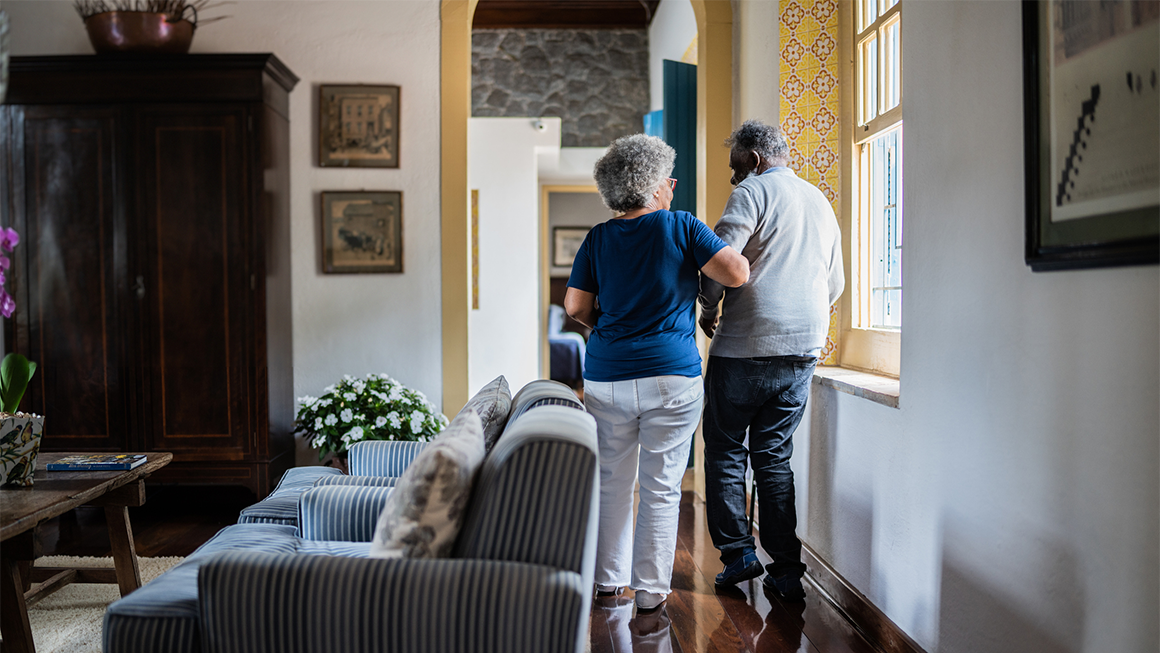 Older adult couple in their home.