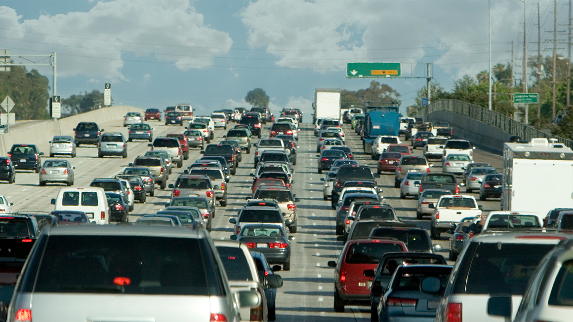 Photo of many cars in traffic on a highway