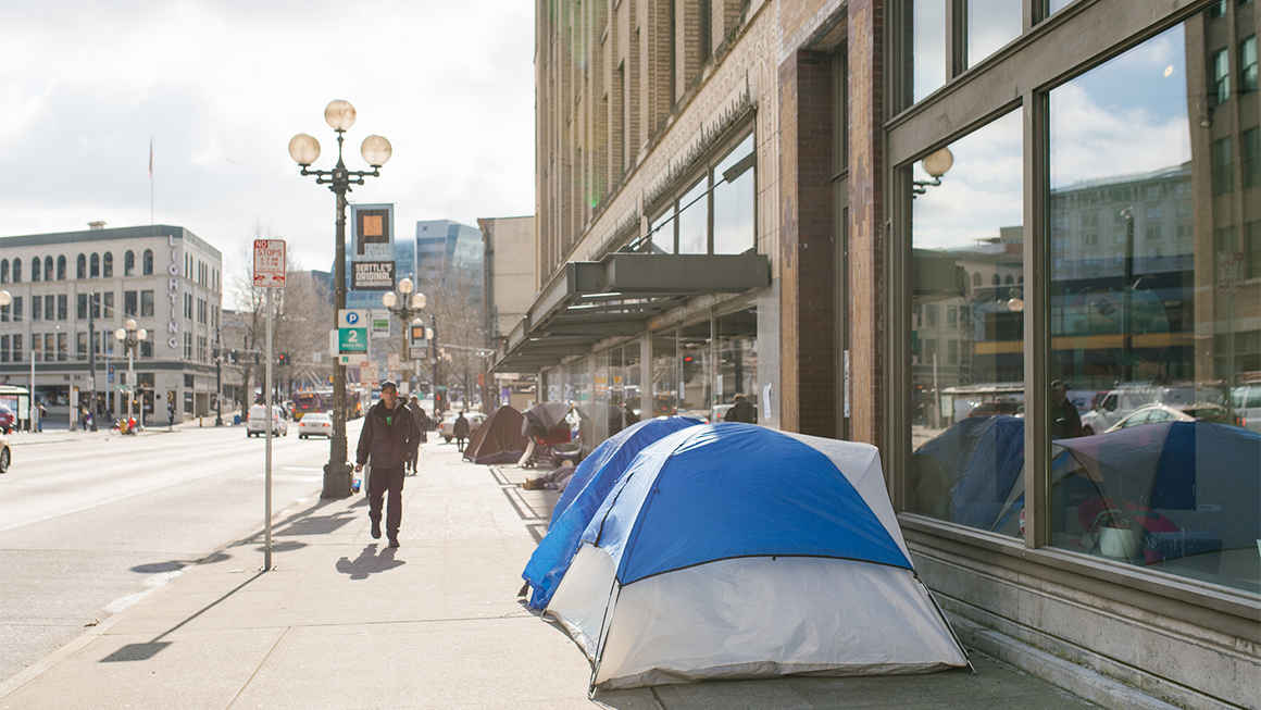 A tent in a city street.