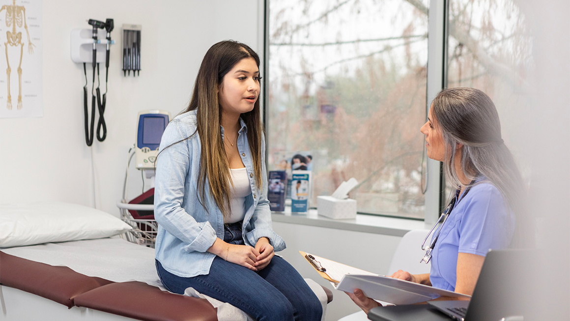 A woman seeing a health care provider