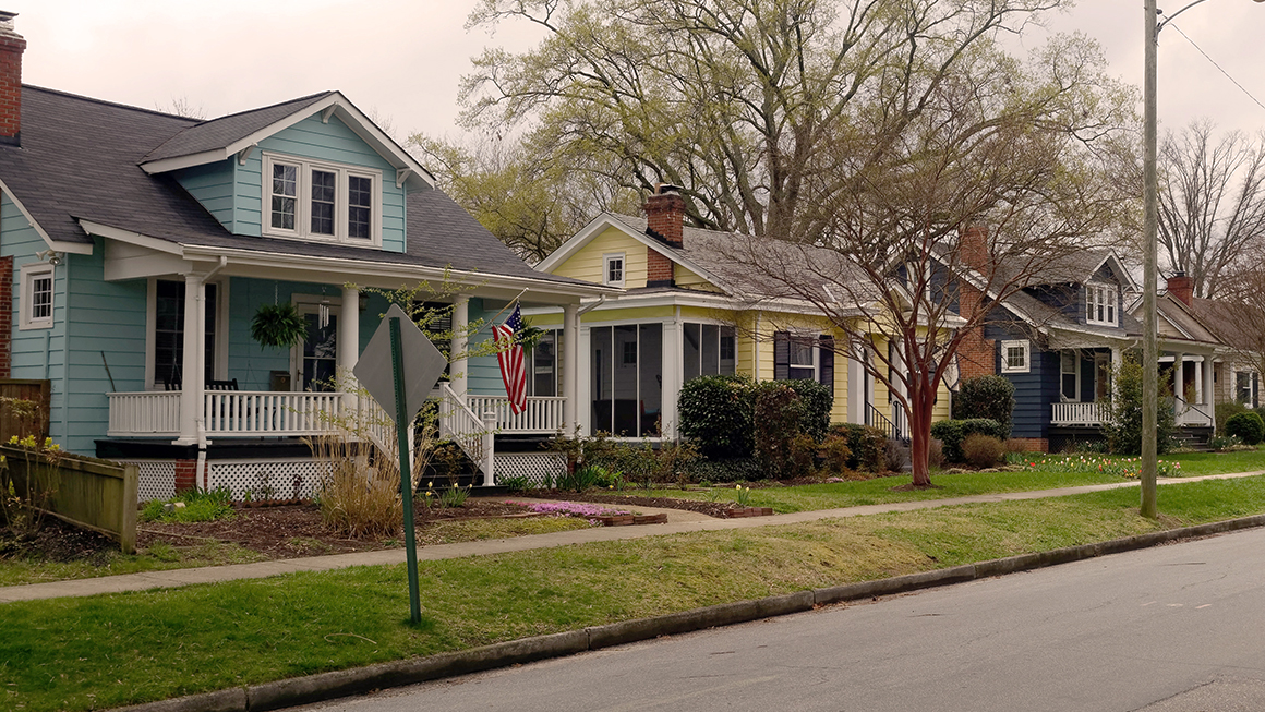 A row of residential single family homes. 