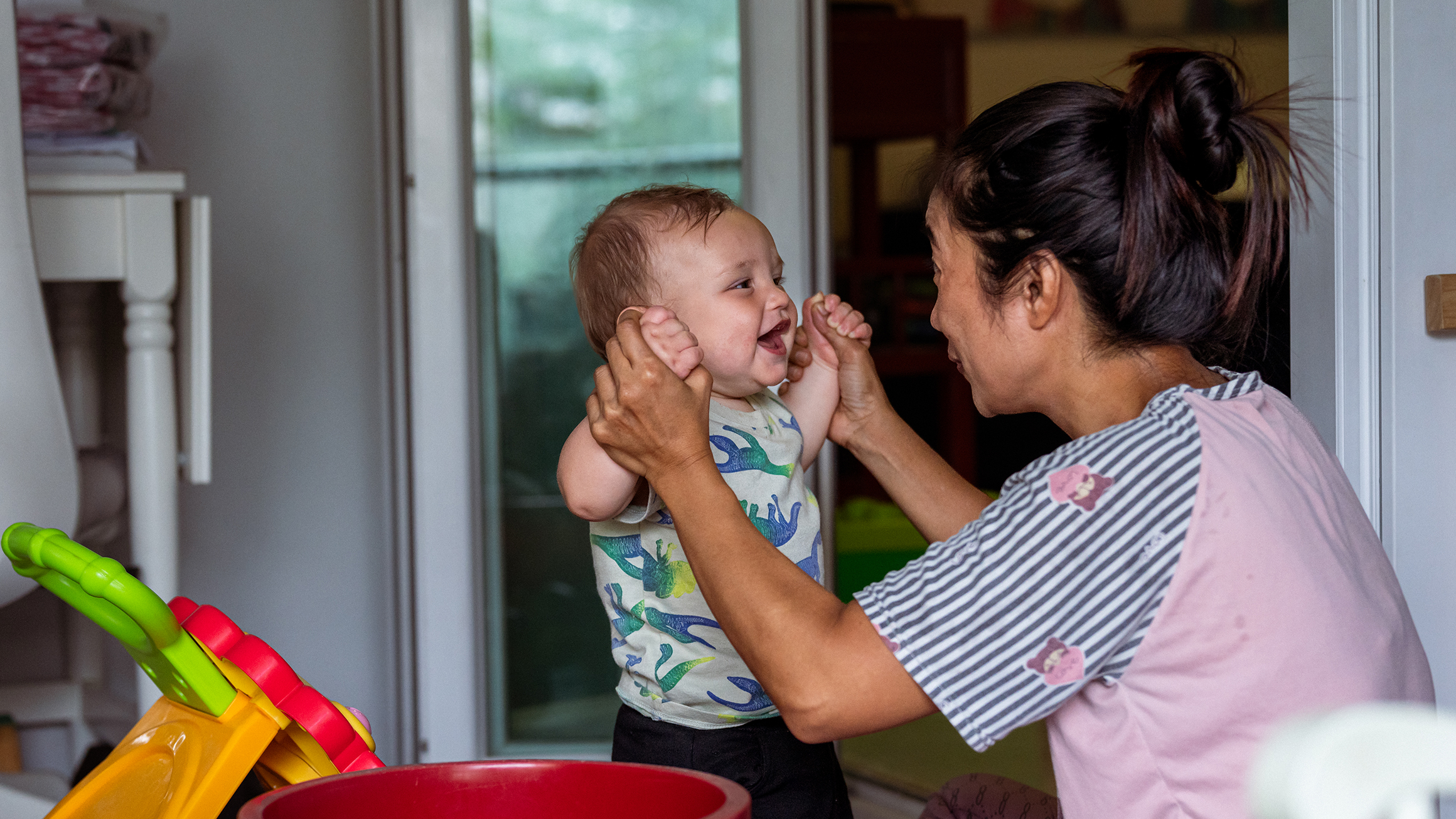 A mother playing with her child.