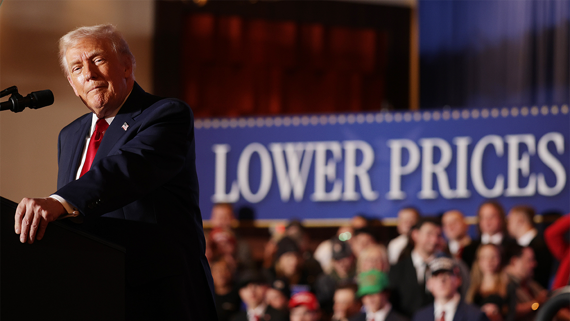 President Trump gives a speech in front of a sign that says “Lower Prices.”