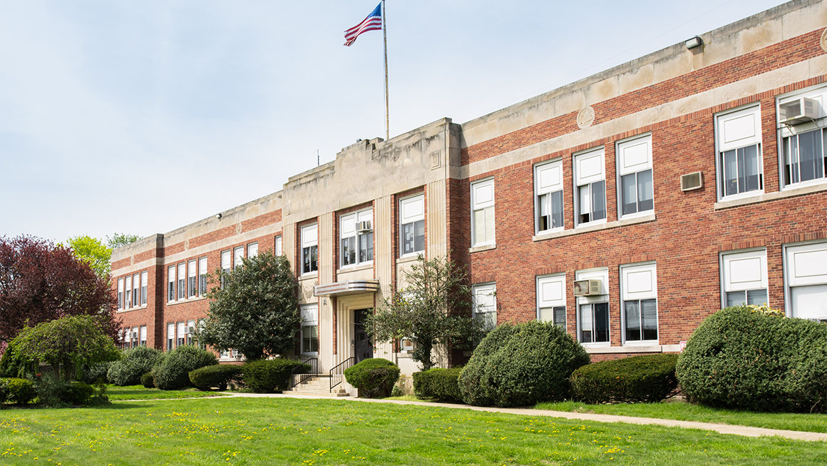 The façade of a middle or high school.