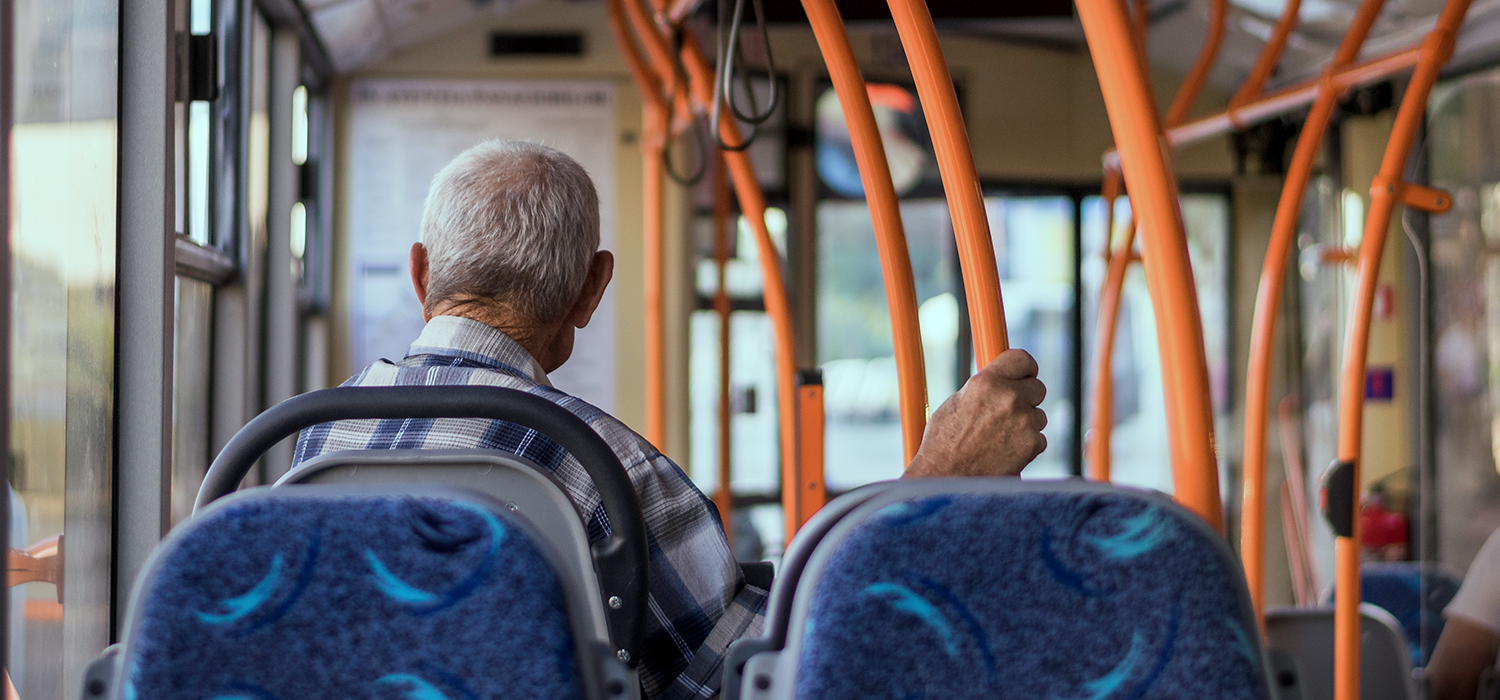 Man rides a bus