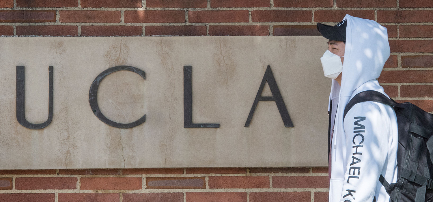 UCLA student wears a face mask