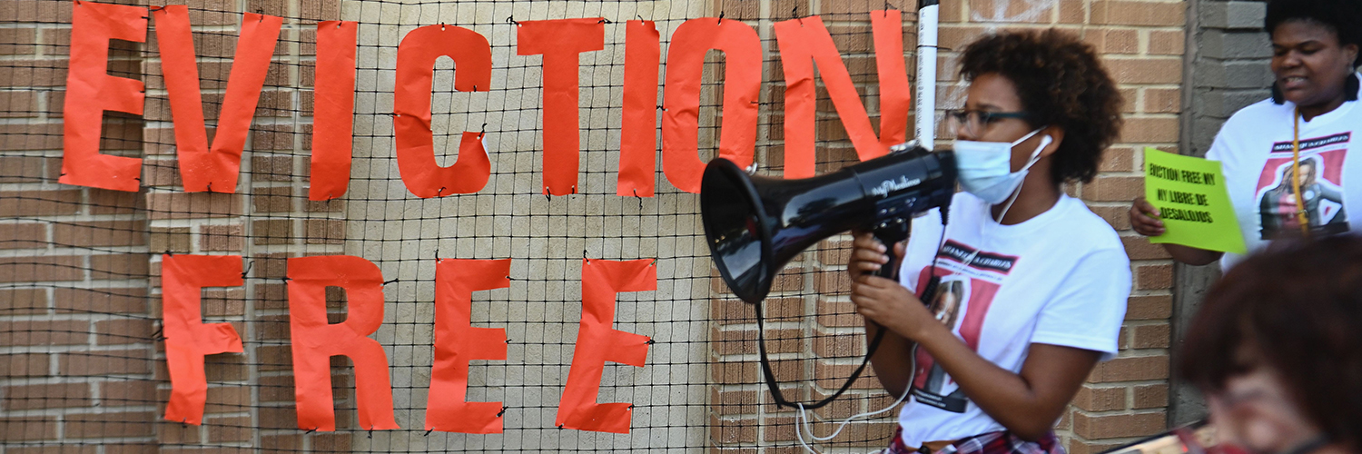 Community member protests evictions