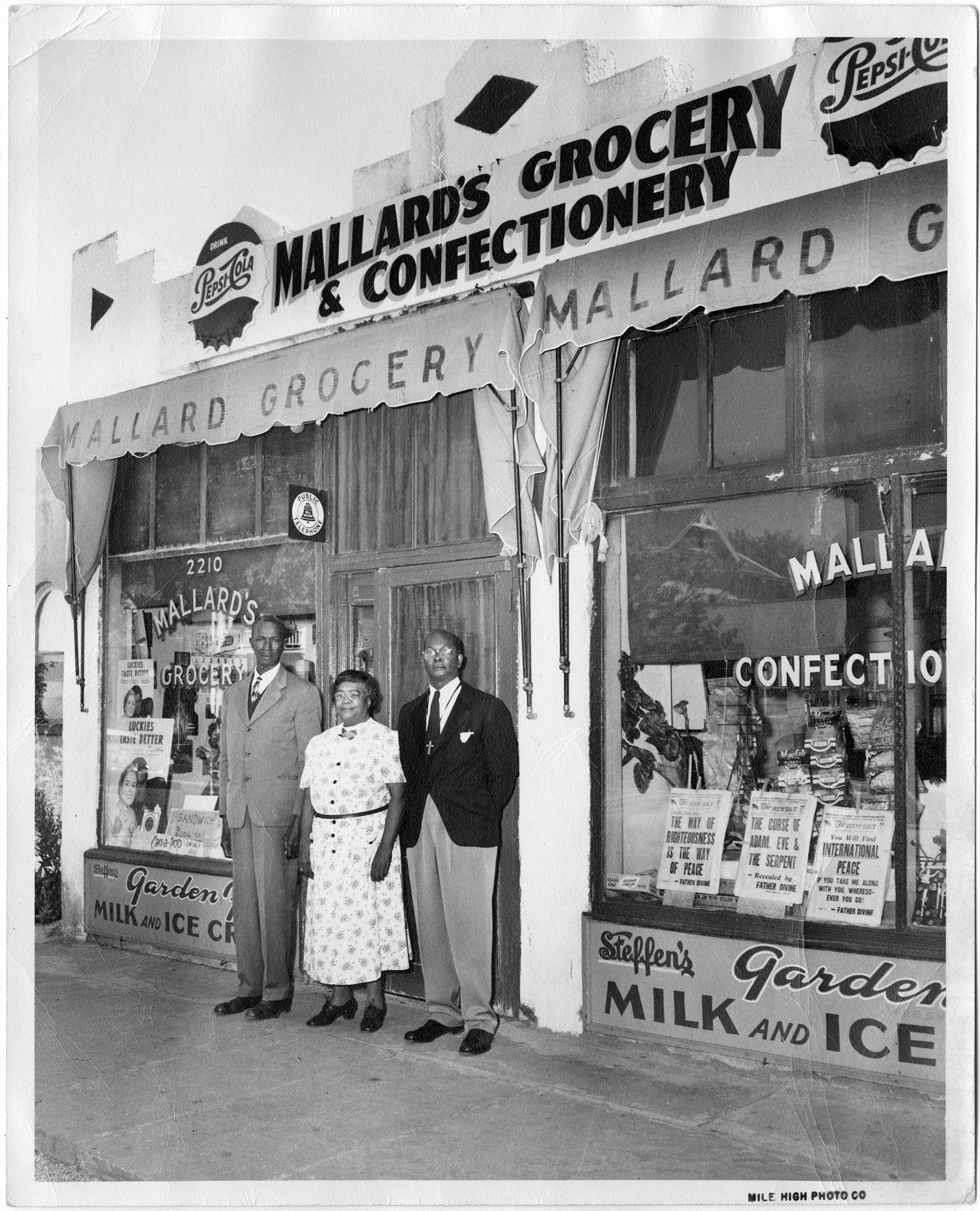 David and Virginia Mallard stand in front of their store, Mallard's Grocery & Confectionery, in 1948.