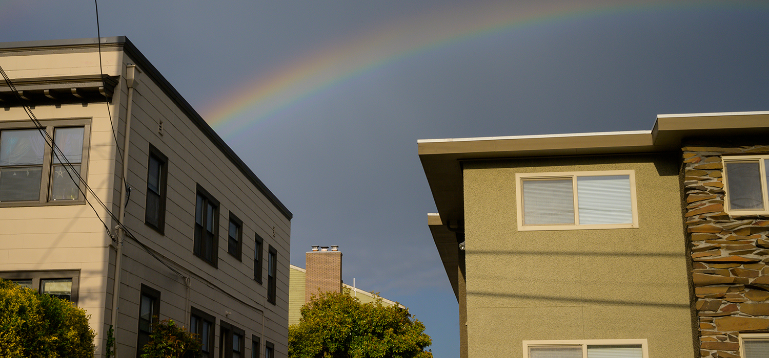 Rainbow over apartment buildings