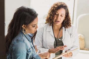 photo of doctor with patient