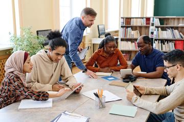 photo of group of people working together